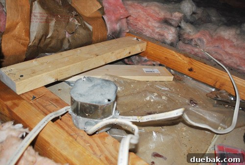 Electrical box relocated and secured in its new attic position