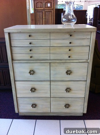 Secondhand Adventures 11 A $49 cabinet with handles resembling the Apartment Therapy logo