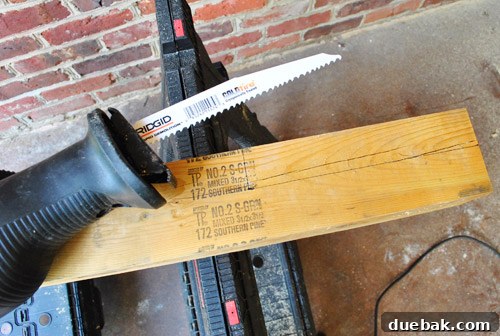 Deck post with pencil lines drawn for the notch cut