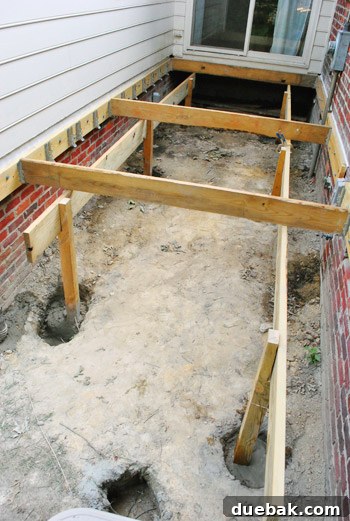 Overview of deck posts and temporary girders, showing empty holes for angled section