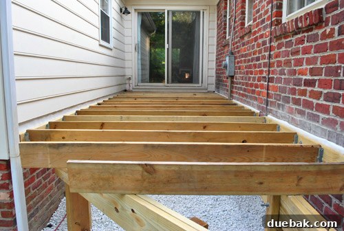 All deck joists successfully installed, completing the framing stage of the deck.