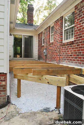 The installed joists with ends left long, awaiting final trimming for rim boards.