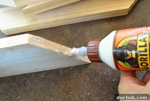 Transform Scrap Wood Into Gorgeous Picture Frames 12 Applying wood glue to frame joints