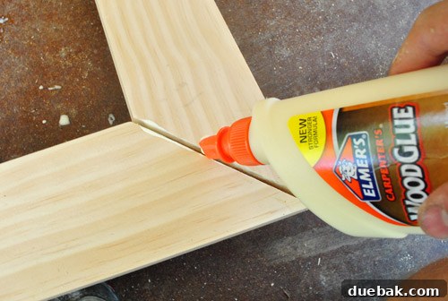 Transform Scrap Wood Into Gorgeous Picture Frames 16 Applying more glue to reinforce frame joint