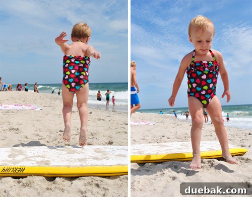 Bethany Beach Bliss: A Delaware Getaway 16 Another shot of Clara joyfully jumping off a boogie board on the beach.