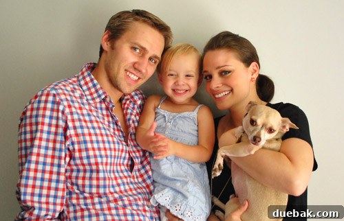 Bethany Beach Bliss: A Delaware Getaway 5 Family portrait with their dog, Burger, included in the shot.