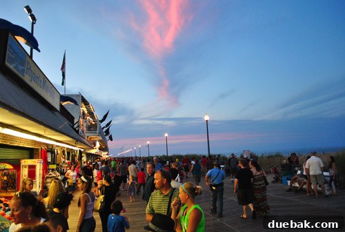 Bethany Beach Bliss: A Delaware Getaway 43 The bustling boardwalk and amusement rides of Rehoboth Beach at night.