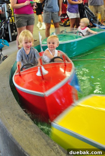 Bethany Beach Bliss: A Delaware Getaway 44 Clara and another child enjoying a kiddie ride at Funland amusement park.