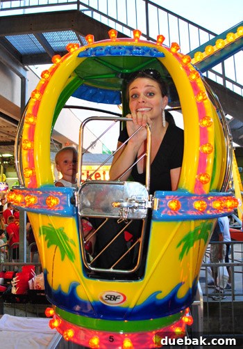 Bethany Beach Bliss: A Delaware Getaway 46 Clara and a family member on a small Ferris wheel ride at Funland.