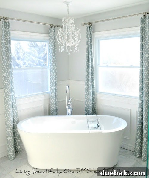 Stunning newly renovated spa-like master bathroom with wainscoting