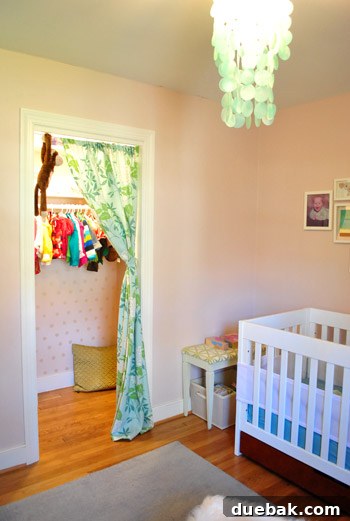 Listy McListerson Refreshed 14 Clara's charming bedroom, featuring painted walls, whimsical curtains, a special reading nook in the closet, and a custom play kitchen.