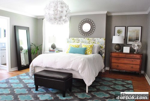Listy McListerson Refreshed 16 Our bedroom featuring a new bed with an upholstered headboard, updated light fixture, and rearranged furniture, creating a serene retreat.