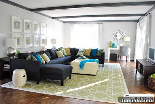Listy McListerson Refreshed 5 Our spacious living room featuring a new sectional, large area rug, gray-washed ceiling beams, and updated media console.