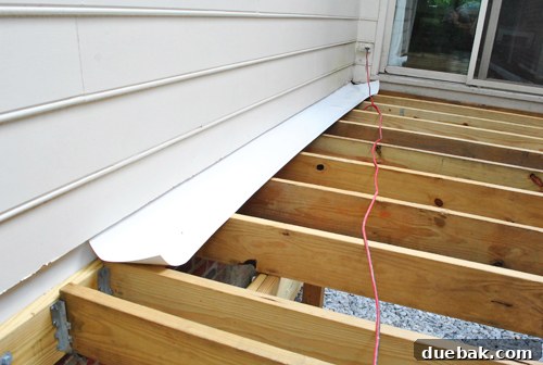 Laying the Groundwork for Your Deck 18 Roll of counter flashing material ready for installation on the deck ledger board