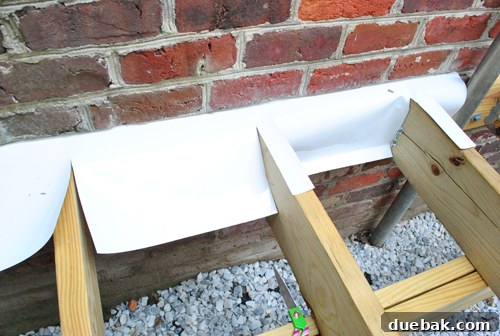 Laying the Groundwork for Your Deck 20 Counter flashing installed around joists, directing water away from the house