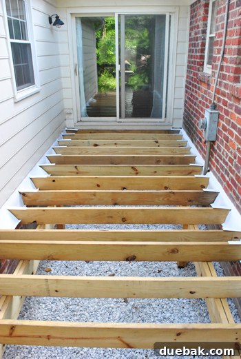 Laying the Groundwork for Your Deck 22 Completed counter flashing on the deck's ledger board, ready for decking