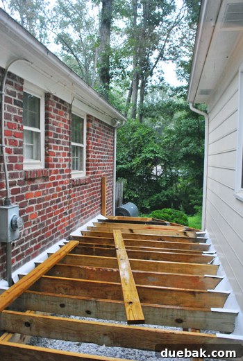 Laying the Groundwork for Your Deck 33 The deck frame during the arduous railing preparation, under changing weather