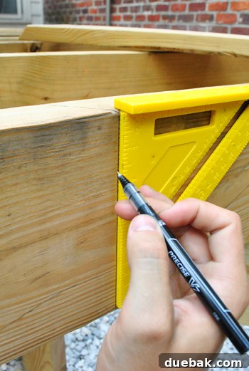 Laying the Groundwork for Your Deck 7 Marking an angled cut on a deck joist using a pivot ruler