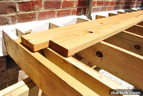 The Foundation of Your Deck 9 Another view of the added joist, crucial for supporting the unique zippered seam pattern.