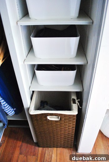 After shot of the closet's bottom section, now tidy and organized with matching bins.