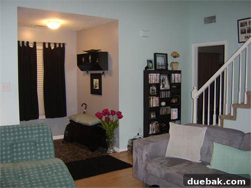 after-livingroom3 Bright aqua living room after renovation with modern furniture