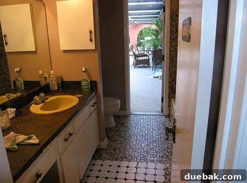 bathroom-before-and-after-dated Dated bathroom with harvest gold cast iron tub and old tiles