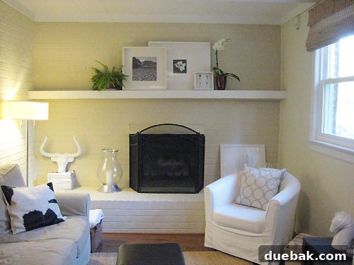 one-mantle-eight-ways Layered frames and potted plants on mantel