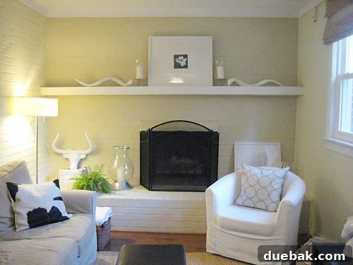 fireplace-mantle-makeover Symmetrical fireplace mantel with horns