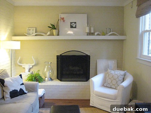 dressing-up-the-den Mantel with framed keys, pear, and P