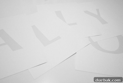 Scripted Canvas: Personalized Quote Art 5 Printed grayscale letters on card stock for stenciling