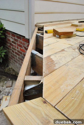 Crafting Your Perfect Outdoor Deck 12 Clean, angled cut edge with sawdust.