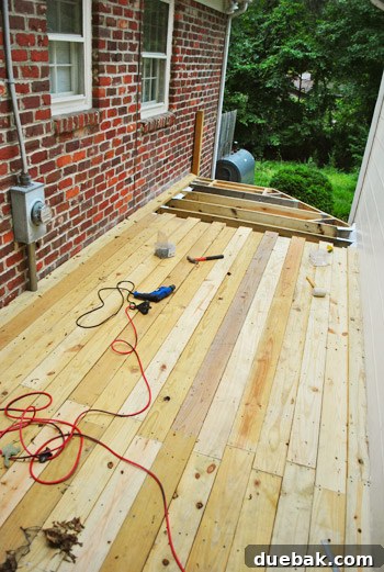 Crafting Your Perfect Outdoor Deck 3 Middle section of the deck now fully decked.