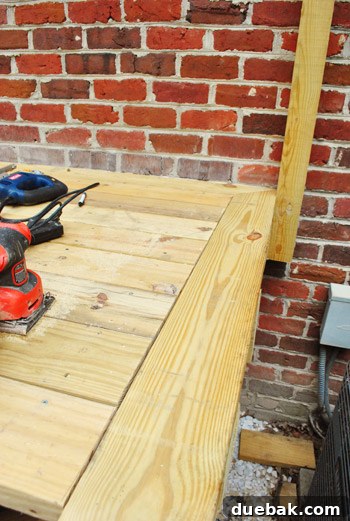 Crafting Your Perfect Outdoor Deck 9 Finished straight edge of the deck with the end piece in place.