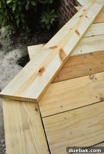 Crafting Your Perfect Outdoor Deck 10 Working on an angled cut for the picture frame border.