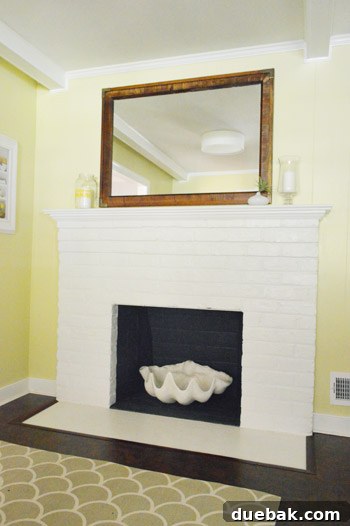 Mirroring Elegance Above the Mantel 9 The newly hung large mirror above the fireplace, showcasing its dramatic impact.