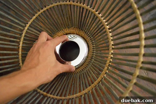 Woven Light: Create Your Own Basket Pendant 11 Larger pipe plate securely wedged into the basket opening
