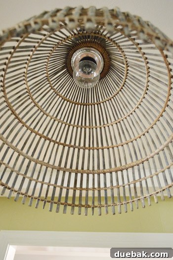 Woven Light: Create Your Own Basket Pendant 14 Close-up of the light bulb safely positioned away from the basket