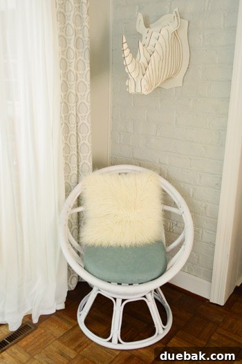 The Rise of the Egg Chair 11 The egg chair featuring a soft faux fur pillow, adding texture and warmth.