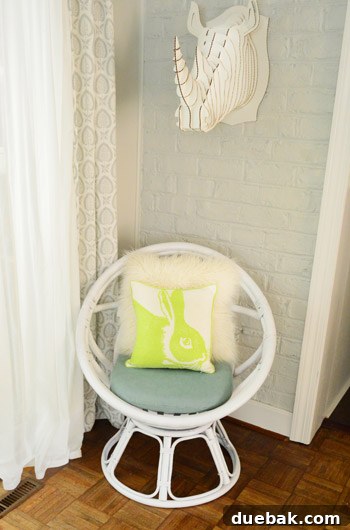 The Rise of the Egg Chair 12 The egg chair accessorized with a whimsical bunny-themed pillow.