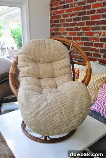 The Rise of the Egg Chair 5 The original, unpainted egg chair as found in a thrift store, showcasing its initial condition.