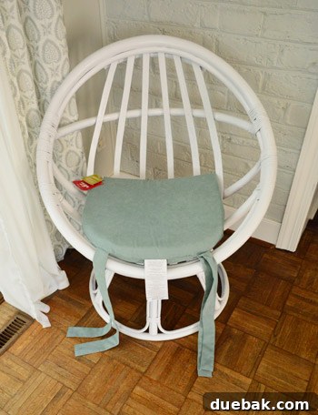 The Rise of the Egg Chair 9 The blue cushion successfully placed in the egg chair after being turned around, fitting perfectly.