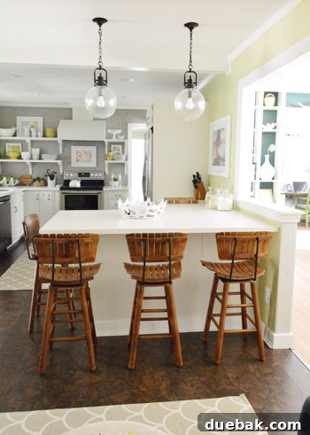 Kitchen Charm: Vintage Wood Stool Finds 4 New vintage stools perfectly complement the kitchen's white counter and cork floors