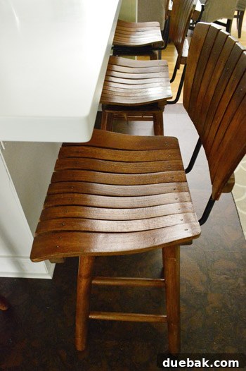 Kitchen Charm: Vintage Wood Stool Finds 5 Another view of the vintage stools at the kitchen peninsula