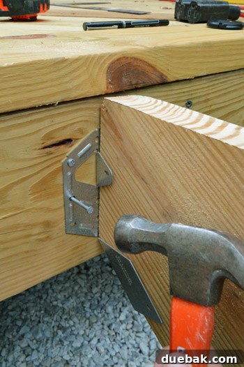 Angled Hangers for Attaching Stair Stringers to Deck Frame