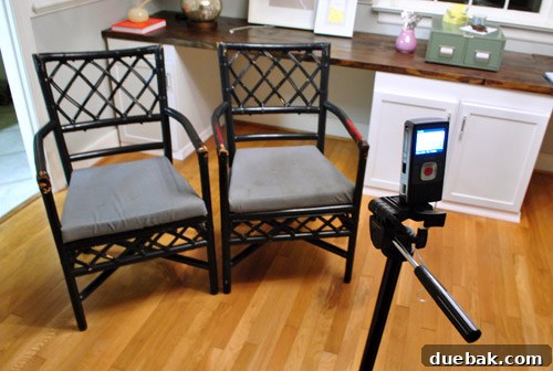 A person holding a camera steady.
