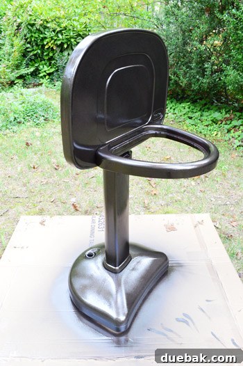 Close-up of the basketball hoop after being spray painted in oil-rubbed bronze