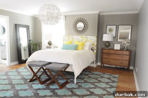 Finished DIY padded ottomans in a bedroom setting, styled and functional