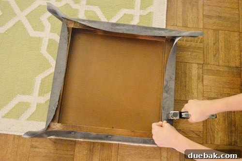Cutting upholstery fabric with generous overlap for stapling