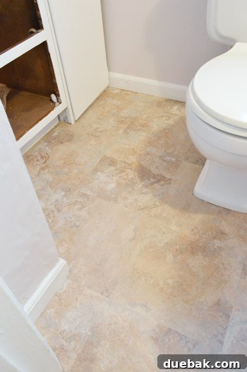 Finished vinyl tile floor with violet walls