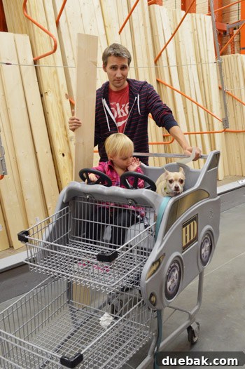 John and Clara at Home Depot, highlighting their DIY lifestyle